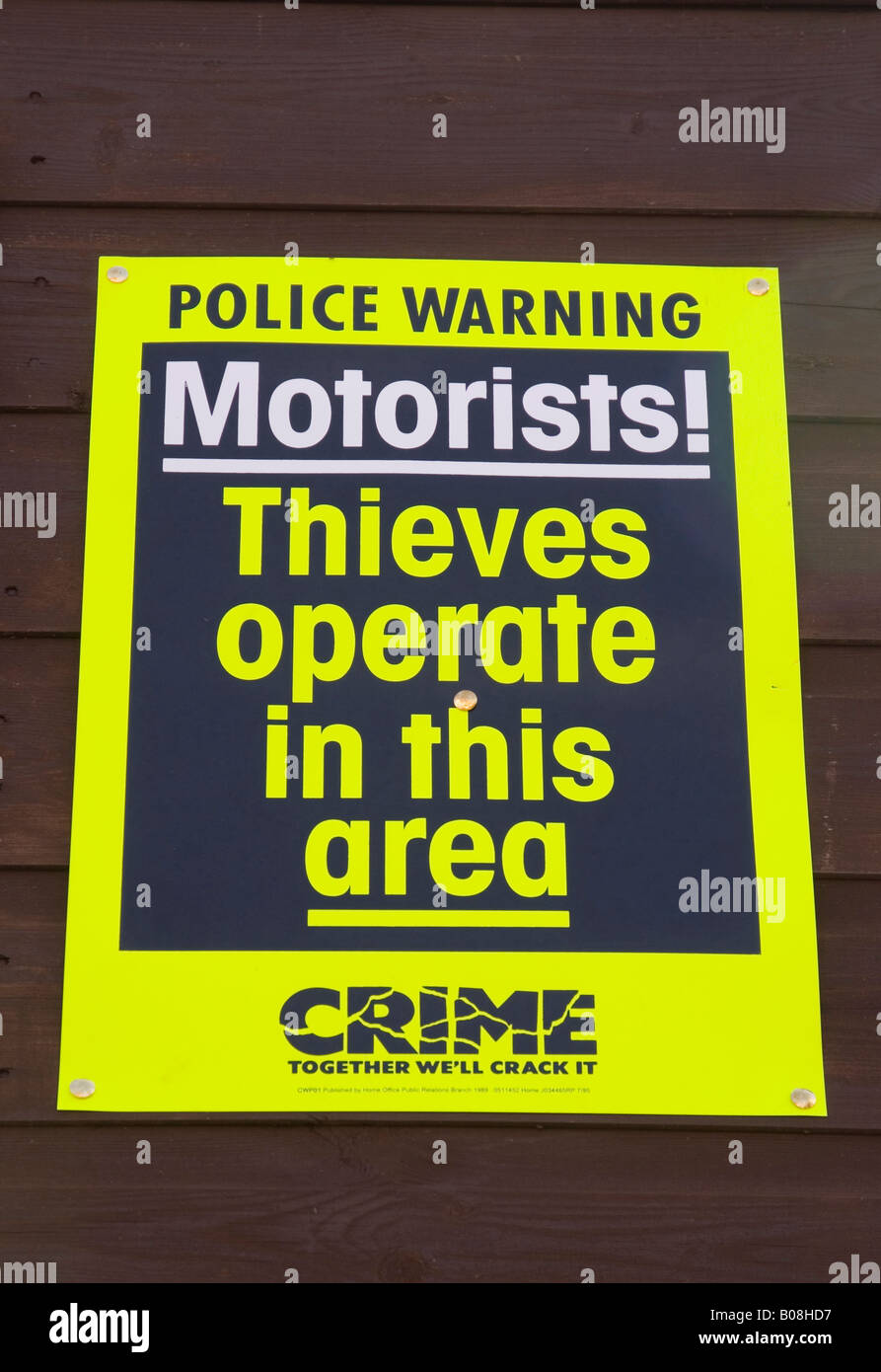 police sign warning of car thieves in the area Stock Photo