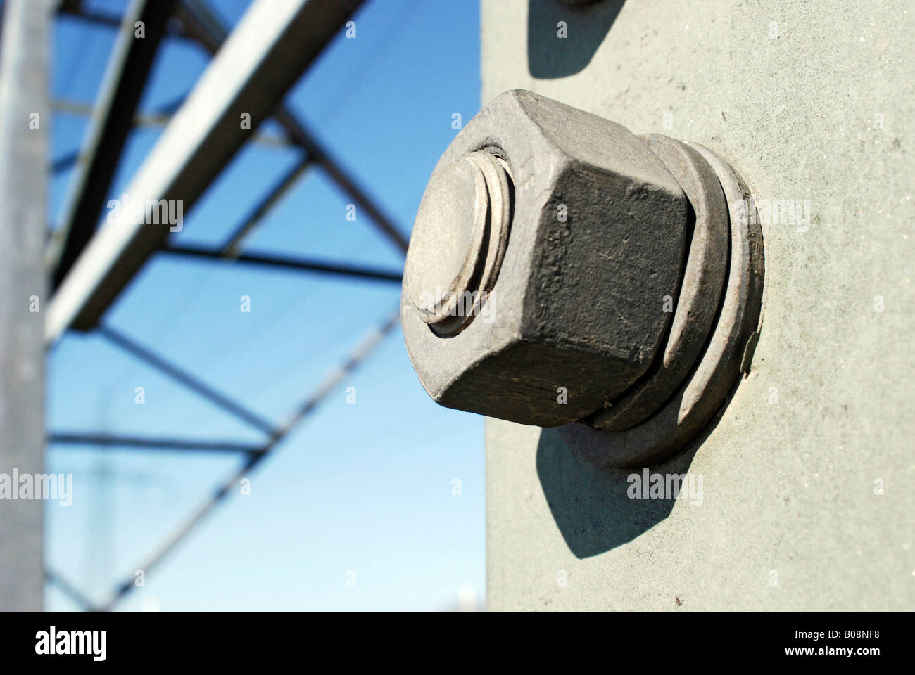 Bolt and nut, screw joint, fixed on a transmission tower Stock Photo
