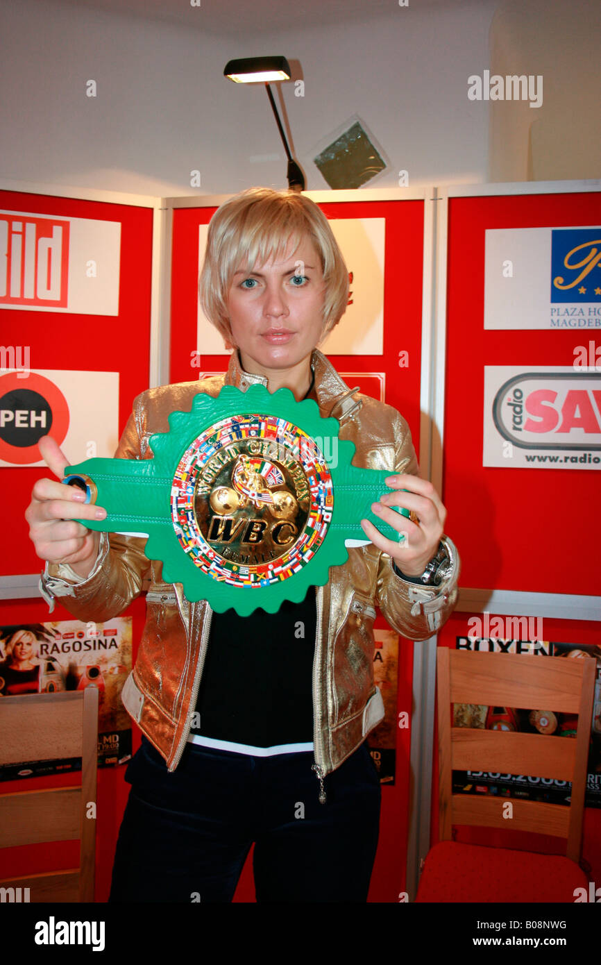 Natascha Ragosina presenting her WBC World Title Belt after the press conference in the Hundertwasser Haus in Magdeburg on the  Stock Photo