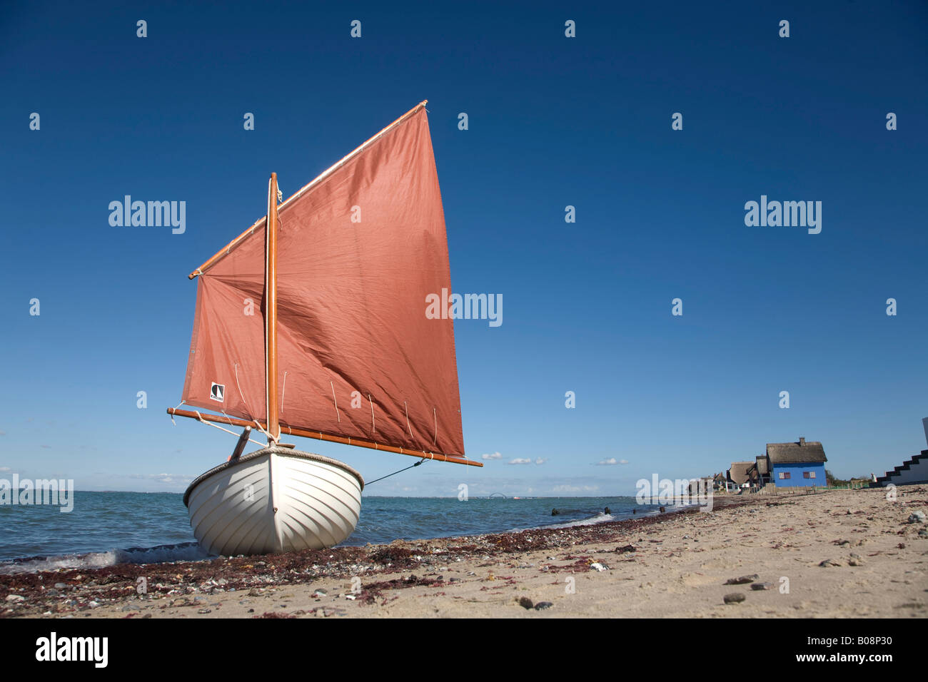 Small viking ship on the Baltic Sea coast, Heiligenhafen, Schleswig Holstein, Northern Germany Stock Photo