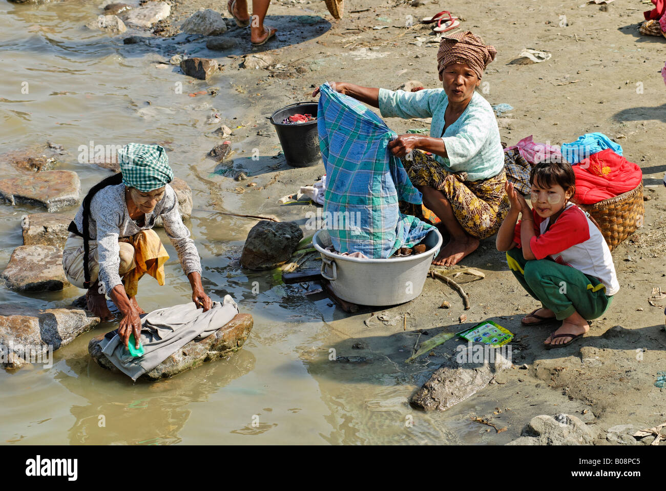 Women washing in river hi-res stock photography and images - Alamy