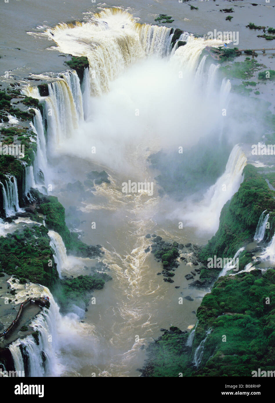 South America; Brazil, Argentina, Igwacu, Igwazu, Fiz, Falls. Igwacu Falls thunder into the Igwacu River below. Stock Photo