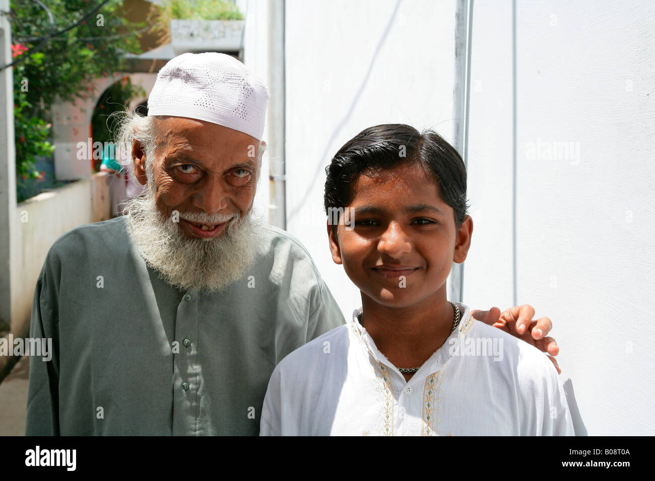 Grandfather with his grandson, Sufis, Bareilly, Uttar Pradesh, India, Asia Stock Photo