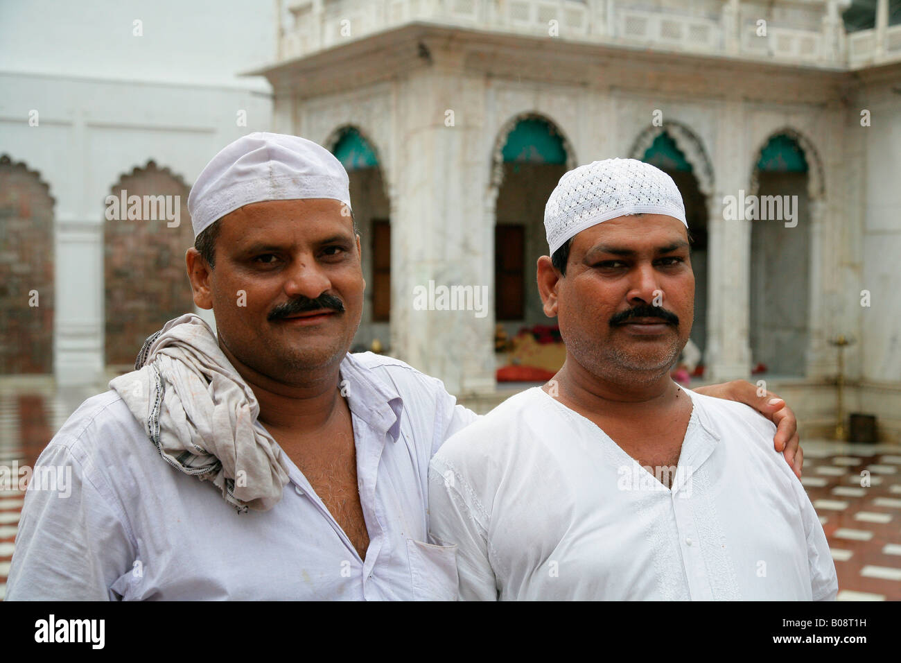 Two men at a Sufi shrine, Bareilly, Uttar Pradesh, India, Asia Stock Photo