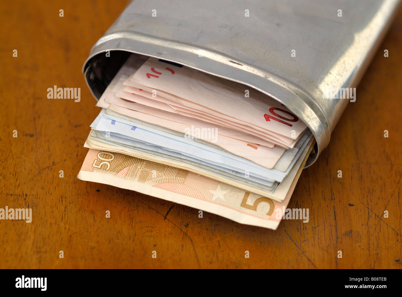 Euro banknotes in a metal box Stock Photo
