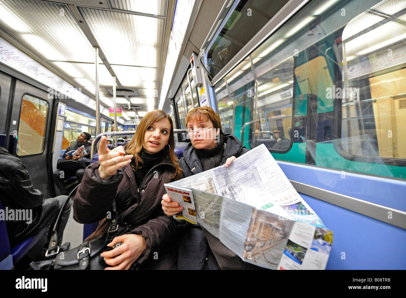 Tourists in the metro, Paris, France Stock Photo