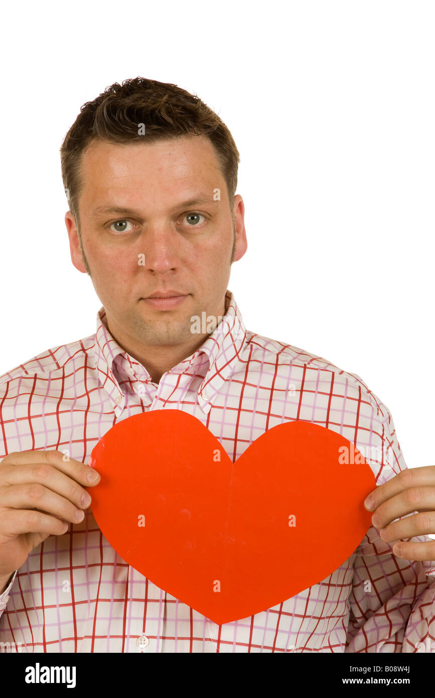40yearold man holding a red heart Stock Photo Alamy