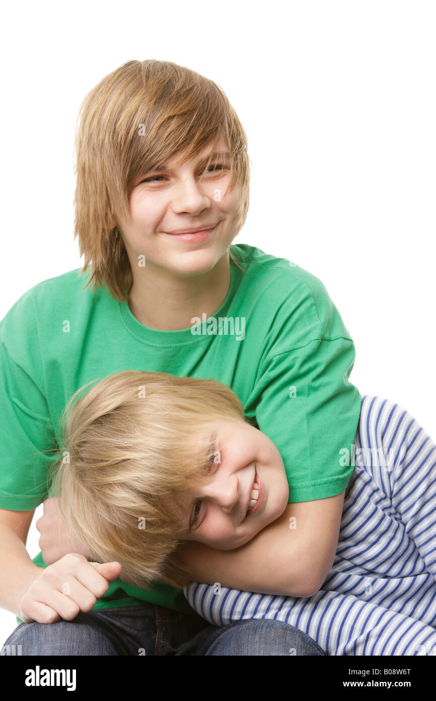10 and 13yearold boys play fighting Stock Photo Alamy