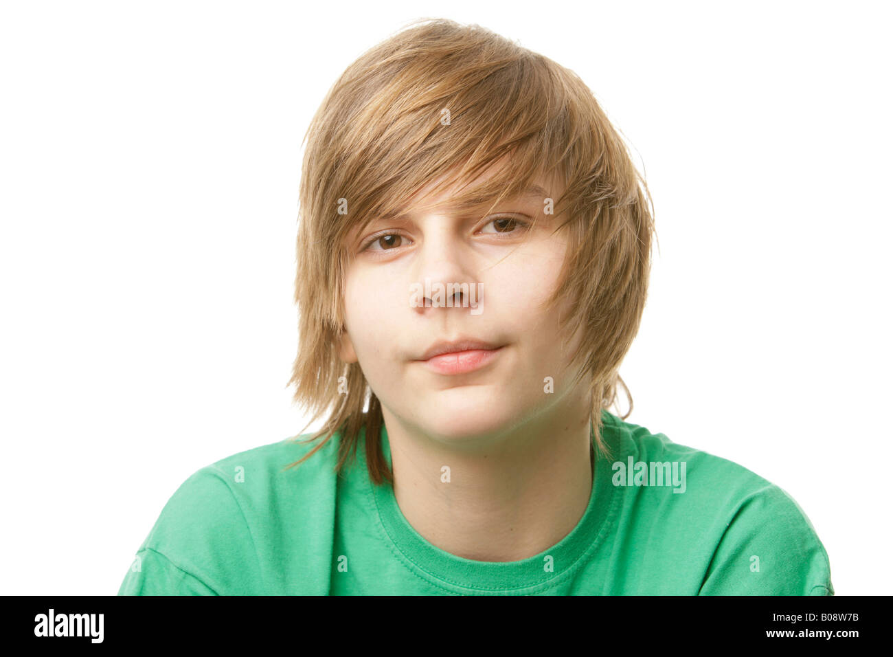 13-year-old boy wearing a green t-shirt Stock Photo