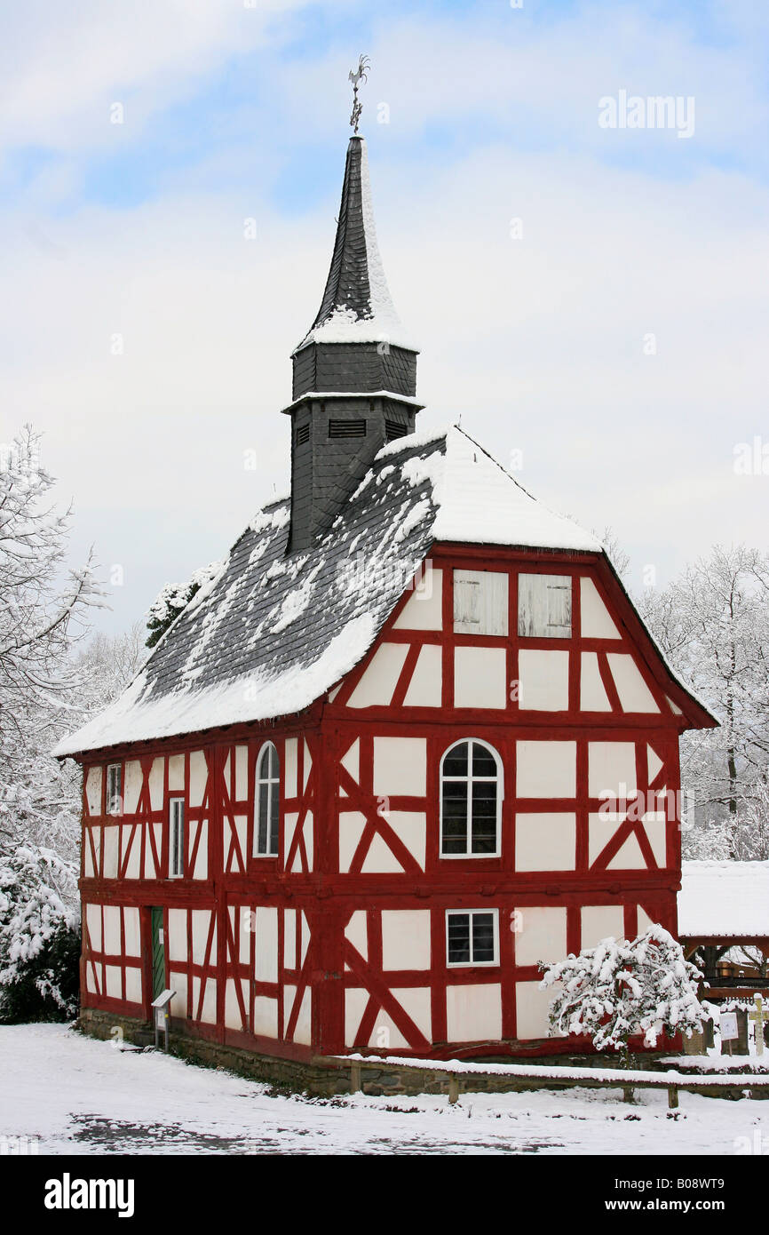 Timbered village church in winter, Hessenpark, Neu-Anspach, Hesse, Germany Stock Photo