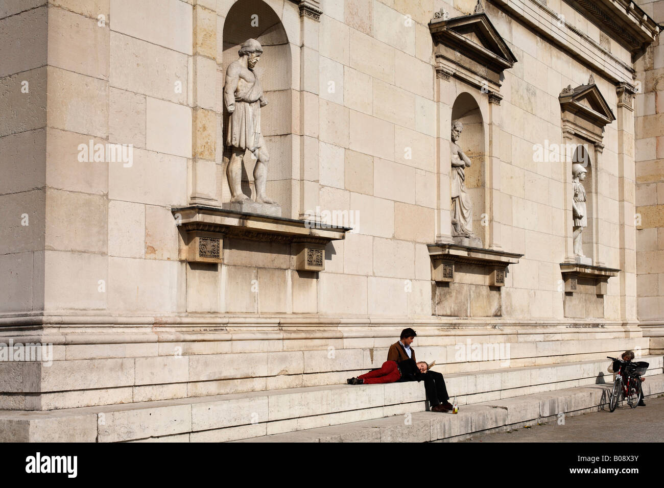 Stone statues built into the outside wall of the Glyptothek, Munich, Bavaria, Germany Stock Photo