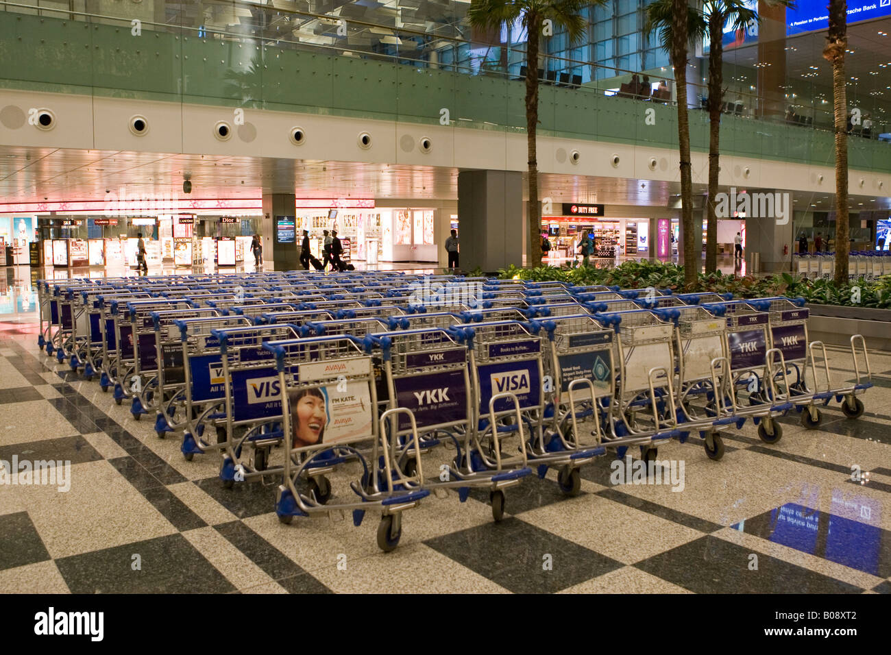 Rows of luggage trolleys inside Singapore Changi Airport, Singapore