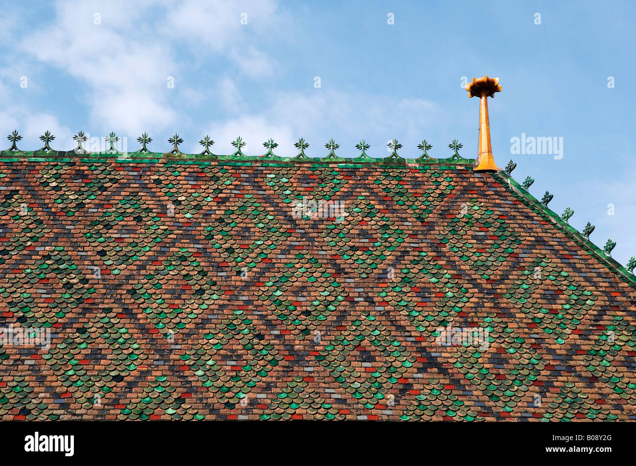 Colourful roof shingles on the Basel Cathedral, Basel, Switzerland Stock Photo