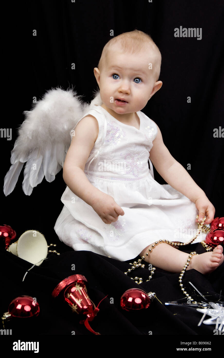 baby as an christmas angel Stock Photo Alamy