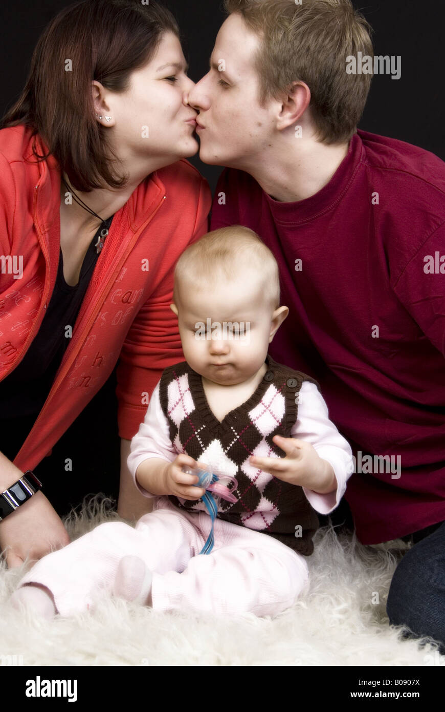 family portrait, parents with baby Stock Photo