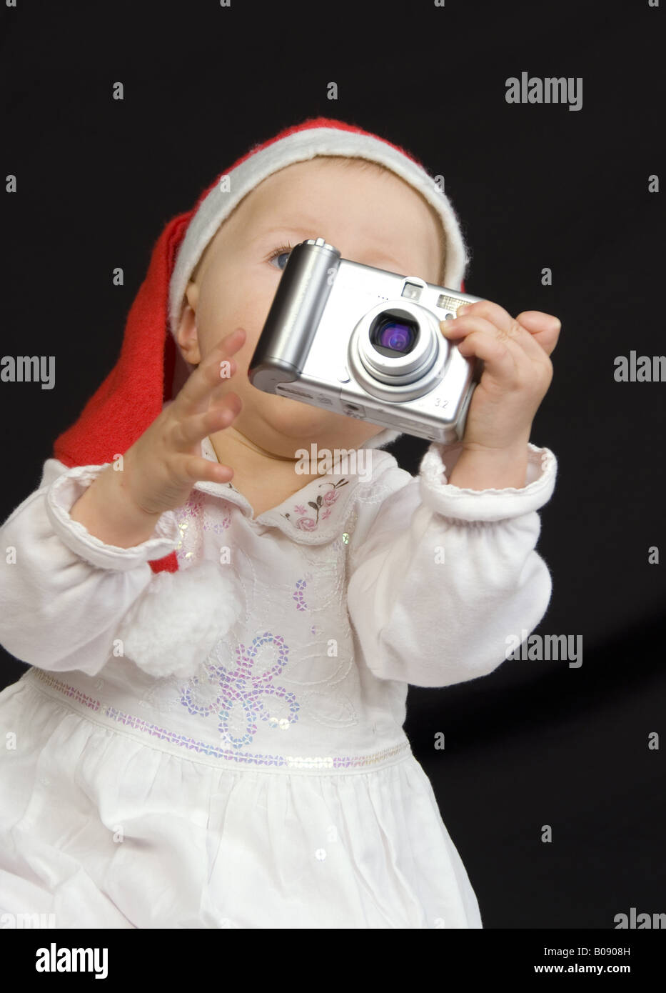 Girl with camera in her hands taking photos hi-res stock photography ...
