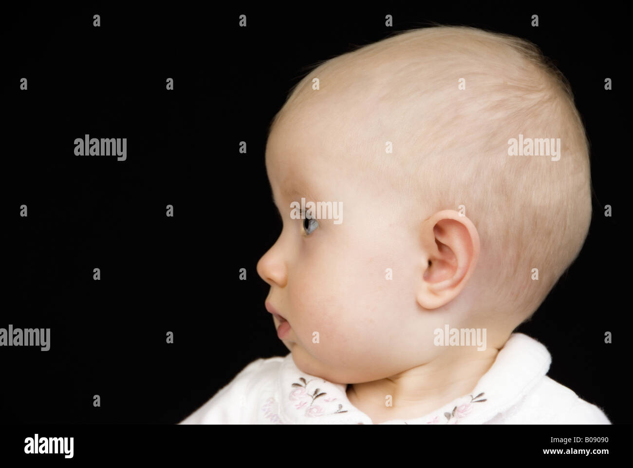 portrait of a baby, side view Stock Photo - Alamy