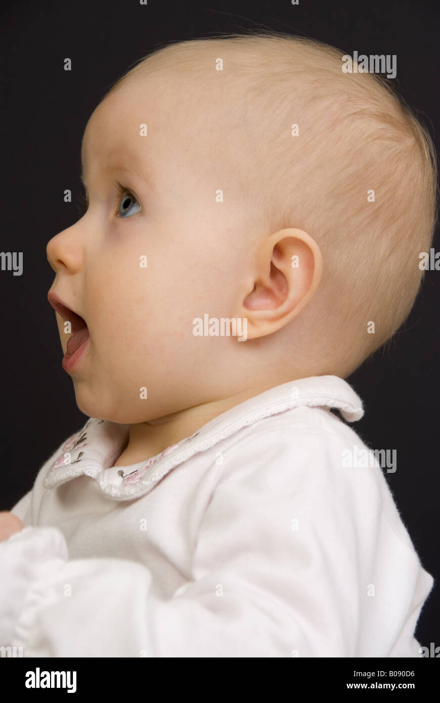 portrait of a baby, side view Stock Photo Alamy