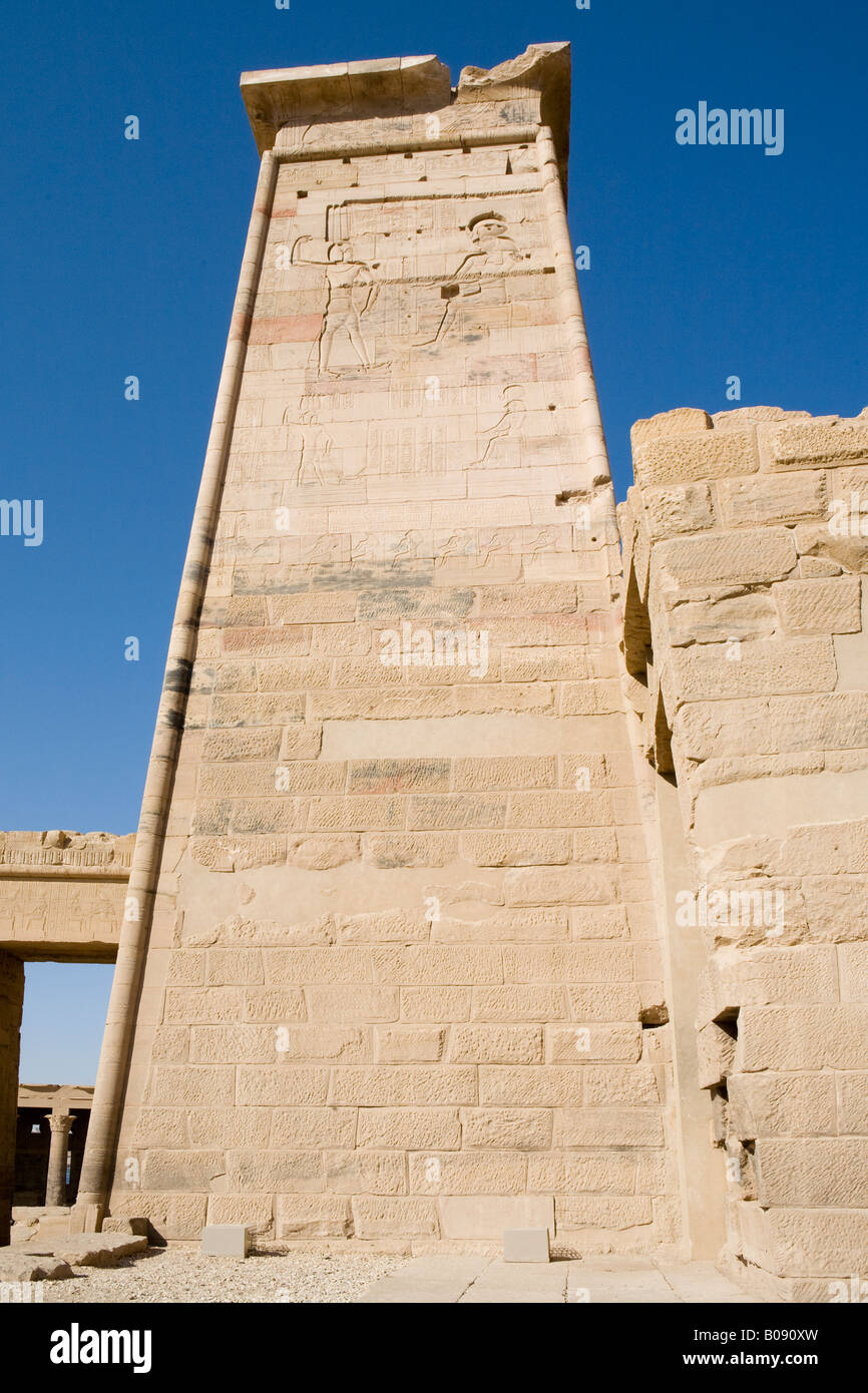 Carved relief on Pylon at the Temple of Isis at Philae, Aglika Island, Aswan Egypt Stock Photo