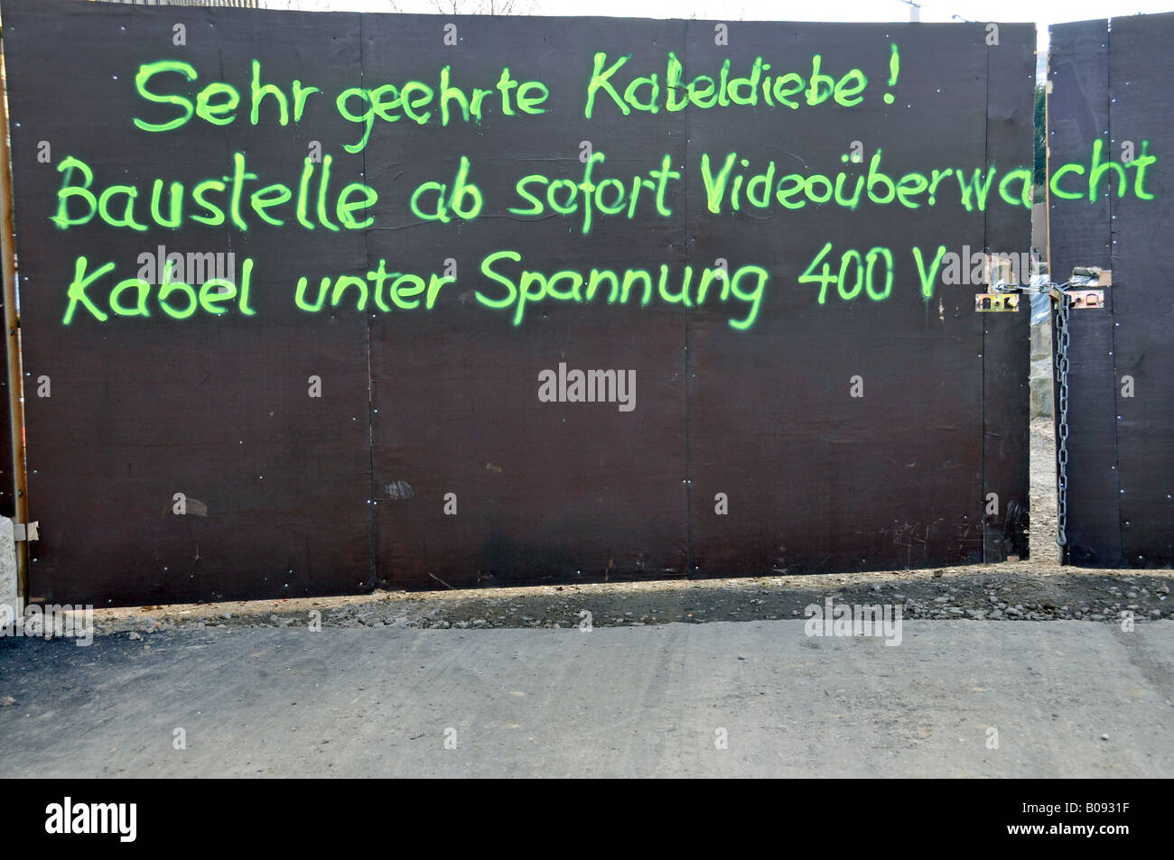 Closed-off construction site, sign warning of video surveillance to prevent theft, Cologne, North Rhine-Westphalia, Germany Stock Photo