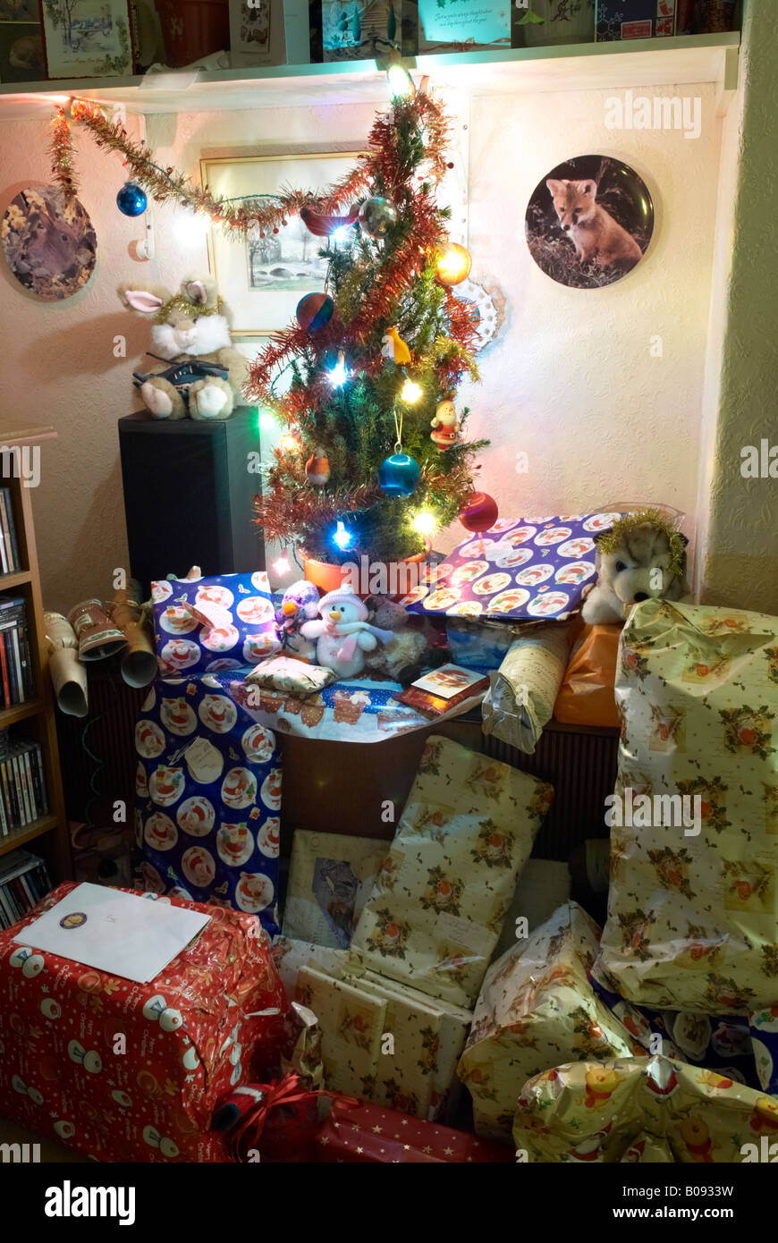 Small Christmas Tree Surrounded By Presents Stock Photo Alamy
