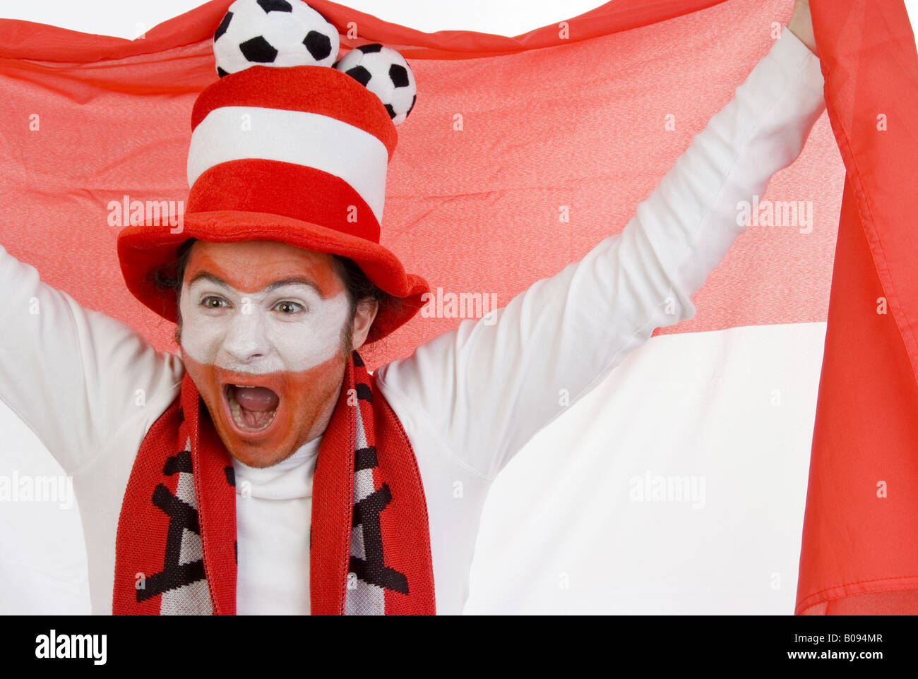 cheering Austrian soccer fan with flag Stock Photo Alamy