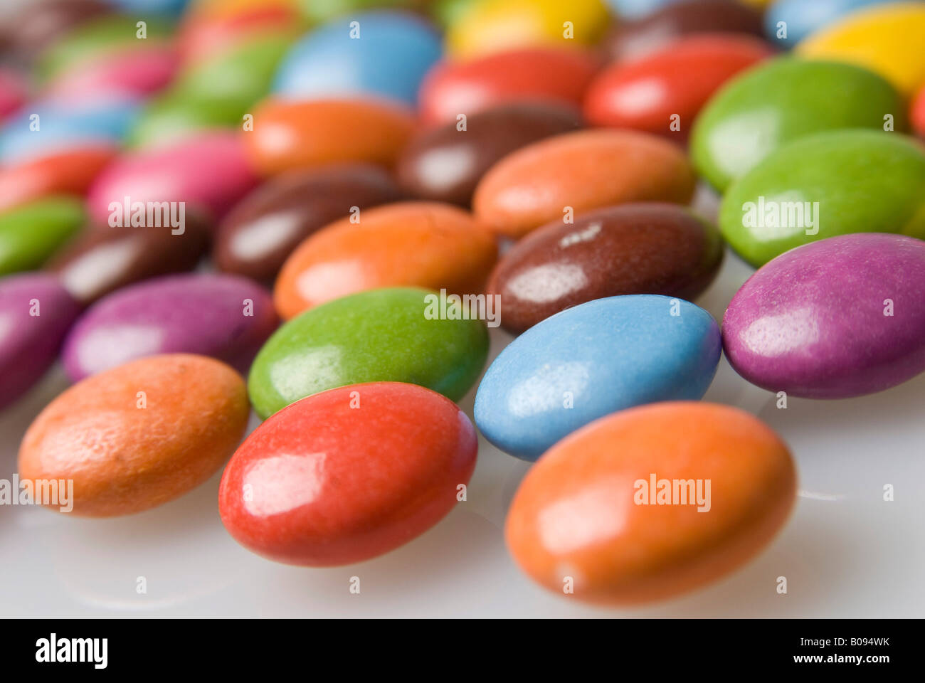 Colourful candycoated, sugarcoated chocolates Stock Photo Alamy