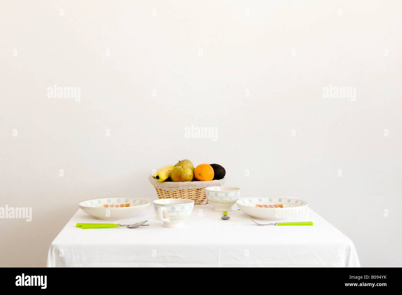 Table setting with fruit bowl Stock Photo Alamy