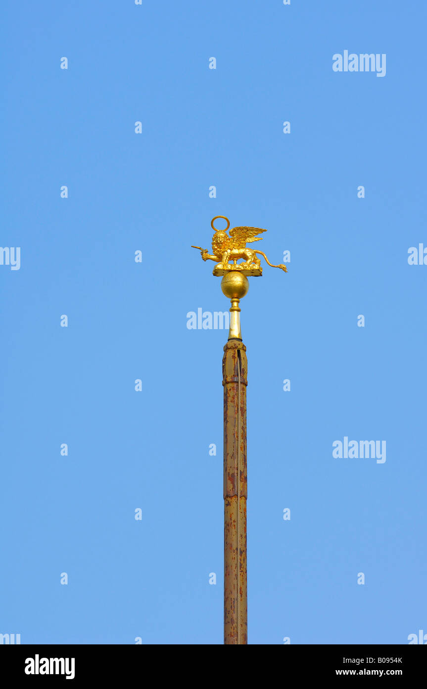Golden Venetian lion on a flagpole, Venice, Venetia, Italy Stock Photo