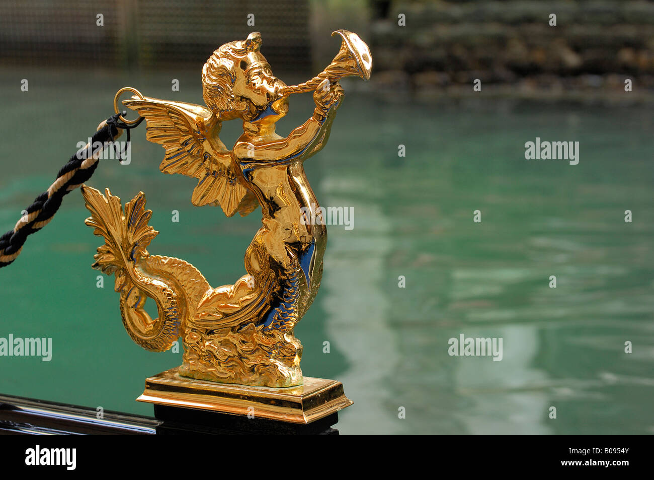Figure on a gondola, golden angel with trombone, Venice, Venetia, Italy Stock Photo