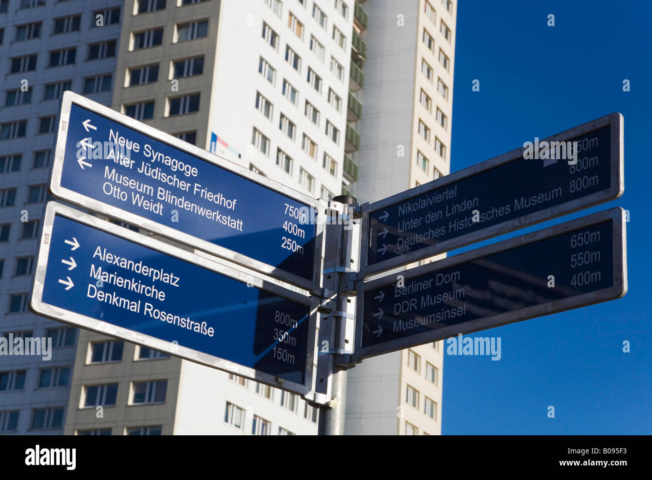 Directional sign indicating the way to various places of interest in Berlin, Germany Stock Photo