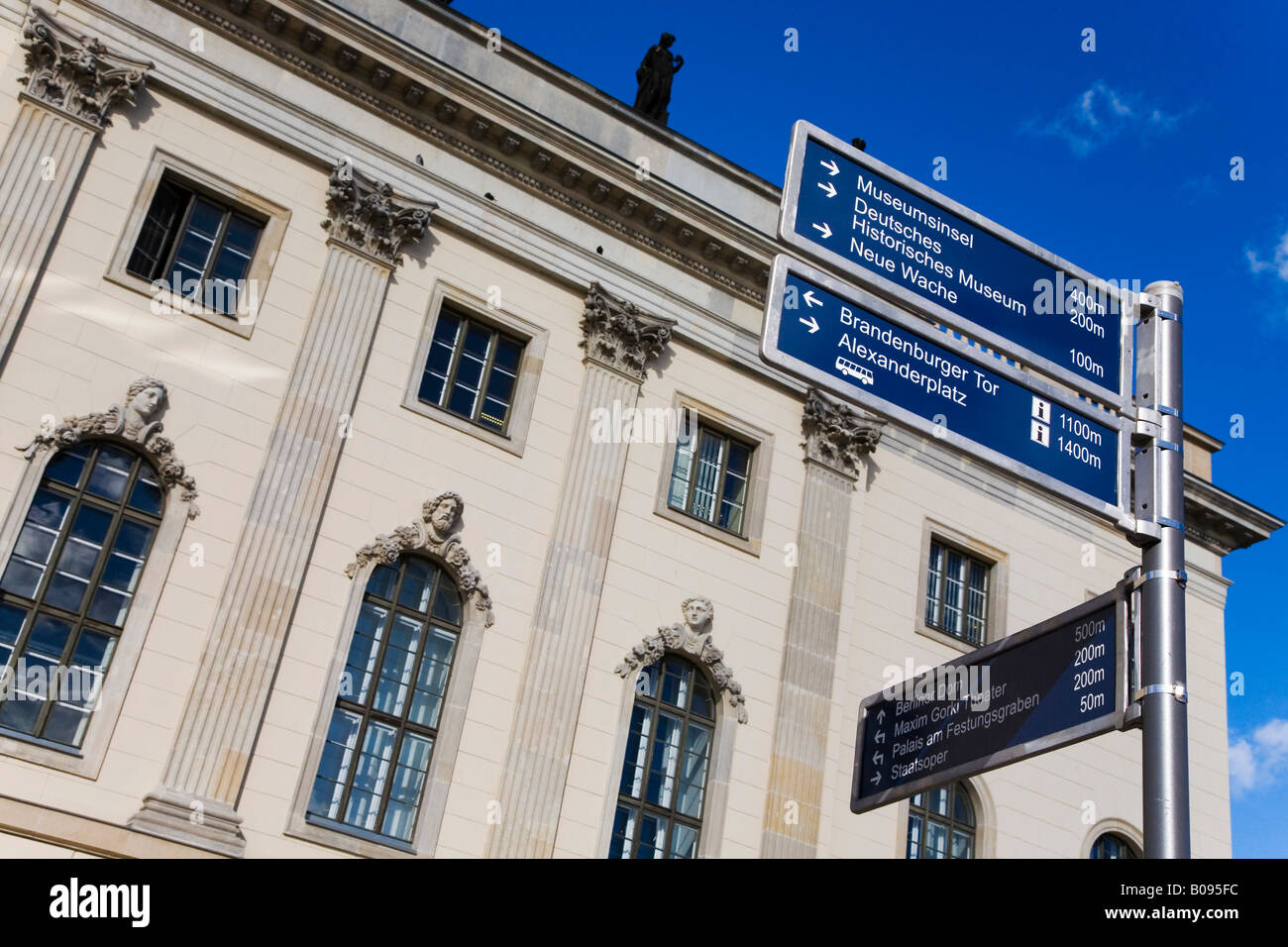 Signpost indicating the way to places of interest in Berlin, Germany Stock Photo