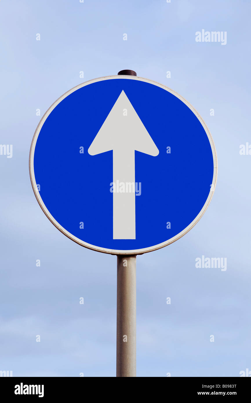 Traffic with an arrow pointing straight ahead, up, upward, rising, north Stock Photo