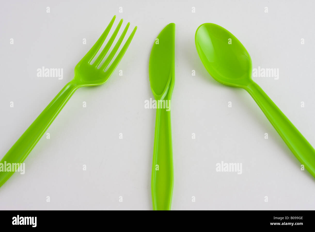Green plastic utensils Stock Photo Alamy