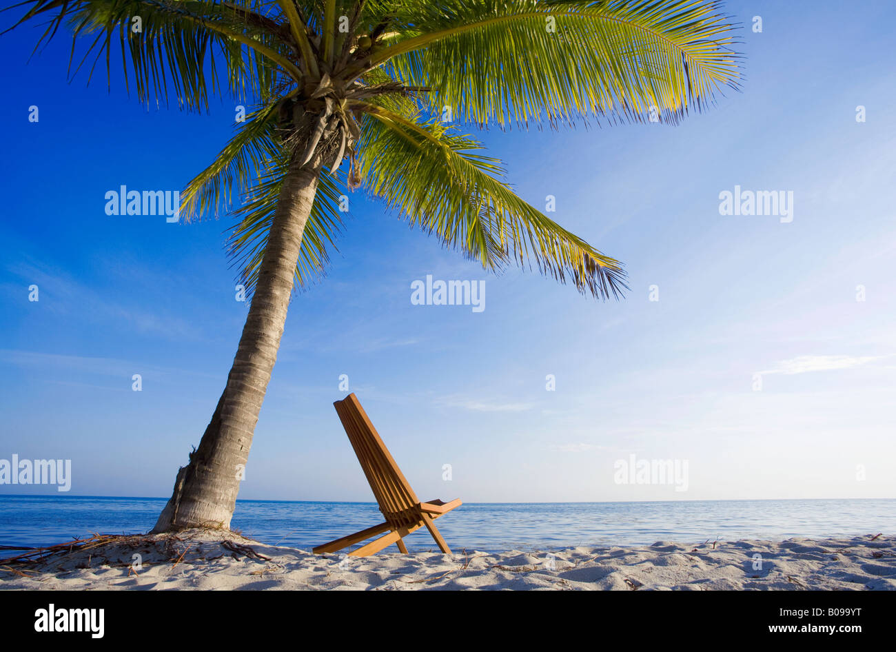 One chair on tropical beach in Key West, Florida, USA Stock Photo