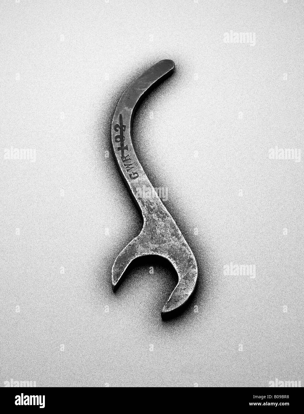 Curved metal spanner Stock Photo