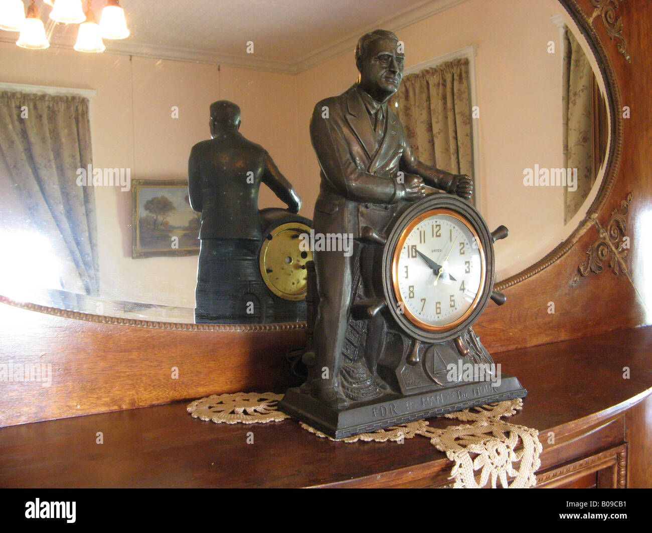 A house that dates from the 1940's has a clock in the living room with an image of President Franklin Delano Roosevelt. Stock Photo