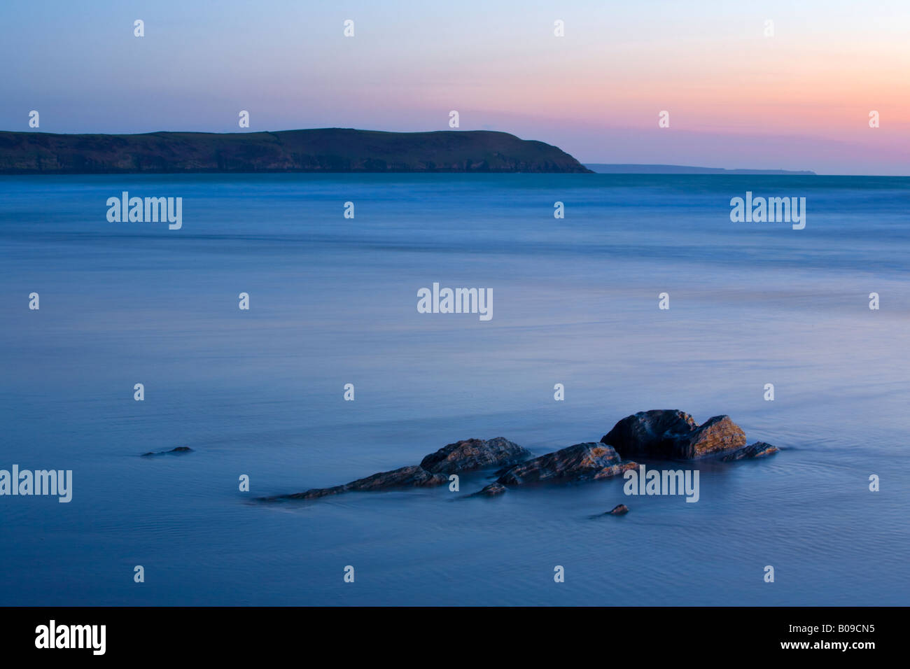 Abstract slow shutter shot of Woolacombe beach with Baggy Point in the distance Stock Photo