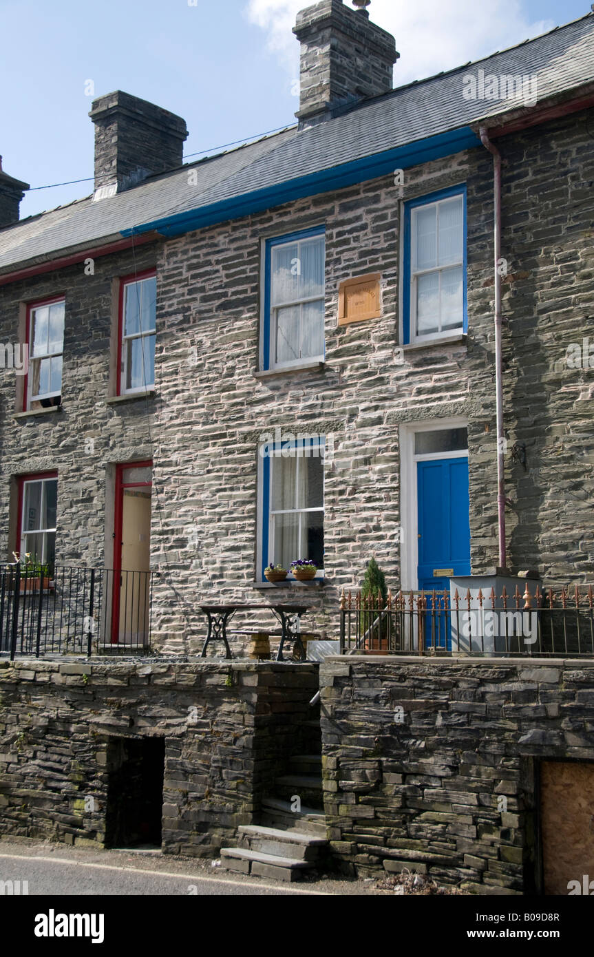 Bethania Terrace built in 1880 Row of old stone built two storey slate quarry workers cottages Upper Corris village Gwynedd Stock Photo