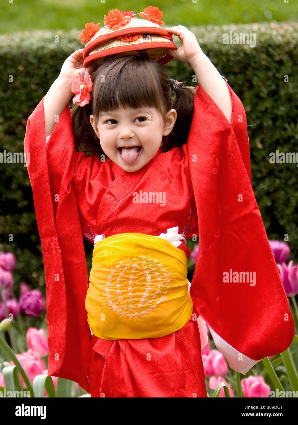 Little girl in red kimono Stock Photo Alamy