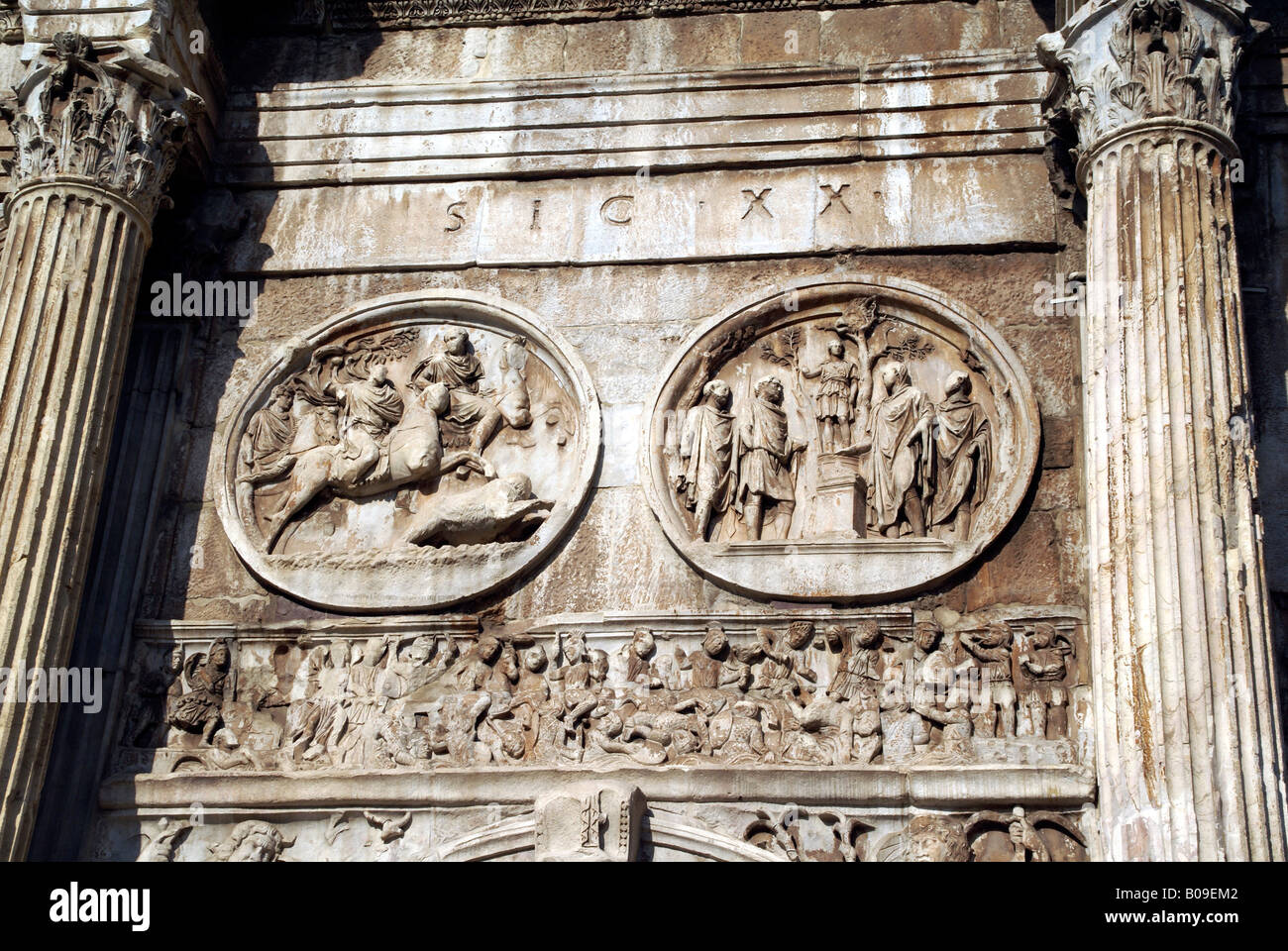Rome Italy Detail of carving above one of the smaller side arches Arch of Constantine Stock Photo