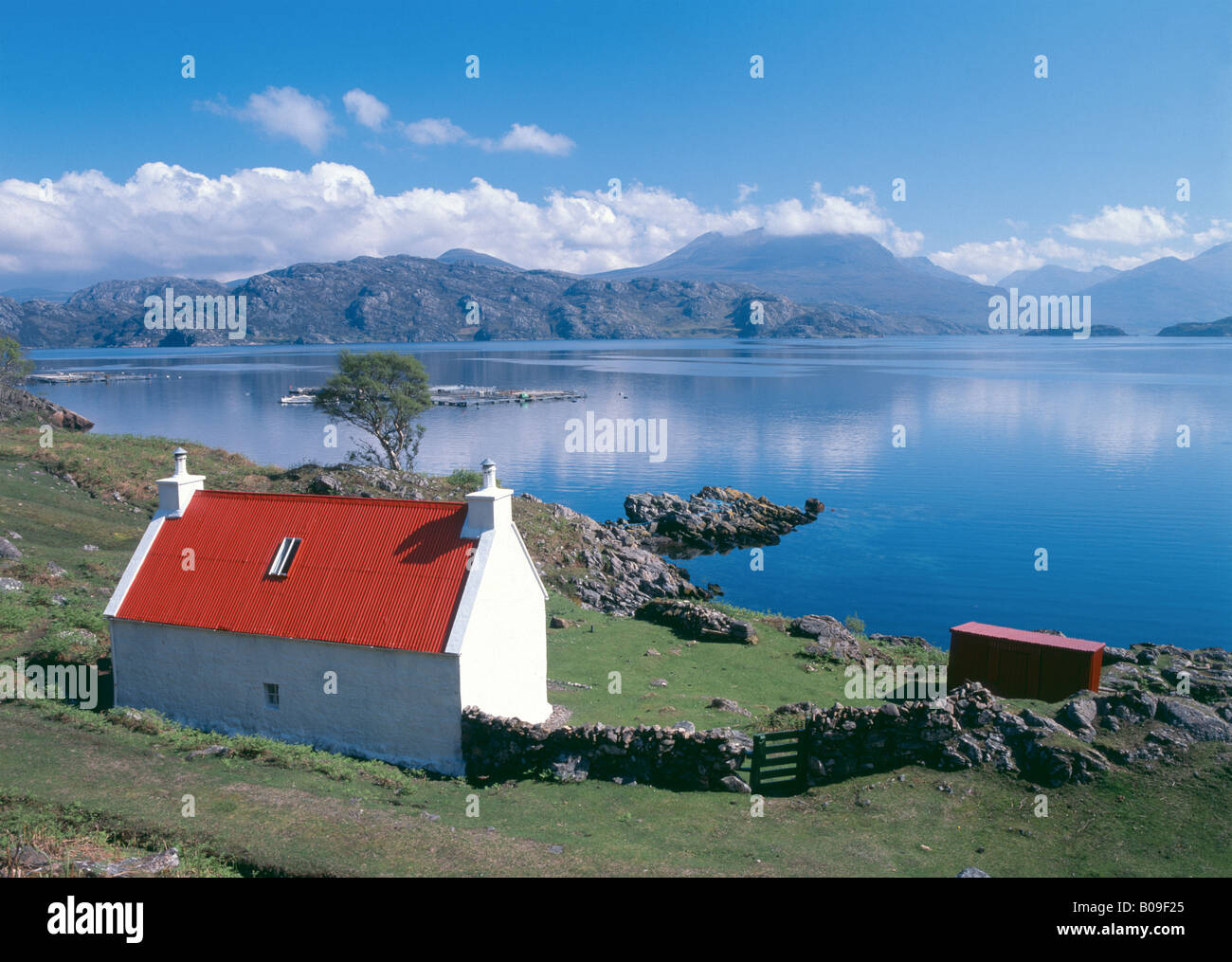 Red Roofed Cottage On Side Of Loch Torridon Wester Ross Scotland