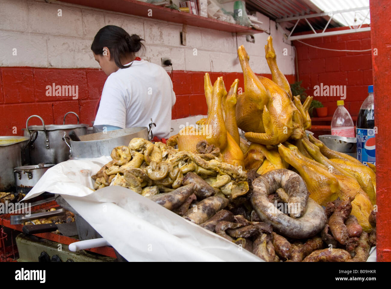 Chicken and meat being prepared in restaurant on the top of Cerro de Monserrate, Bogota Colombia Stock Photo
