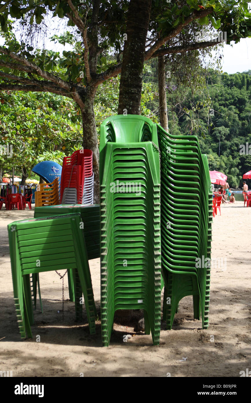 stacked green beach chairs Stock Photo Alamy