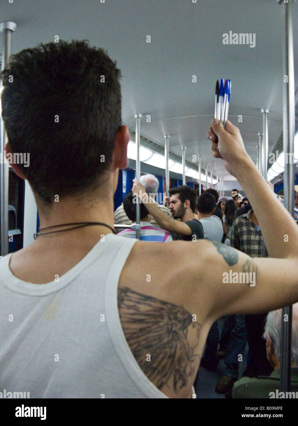 ballpoint pen seller on Athens metro Stock Photo