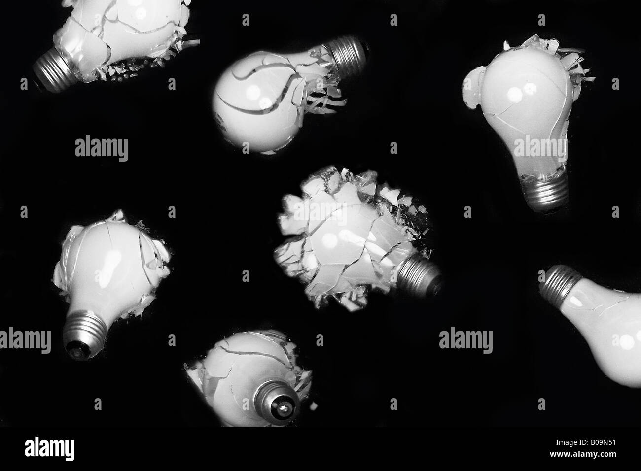 Shattered broken glass against black hires stock photography and