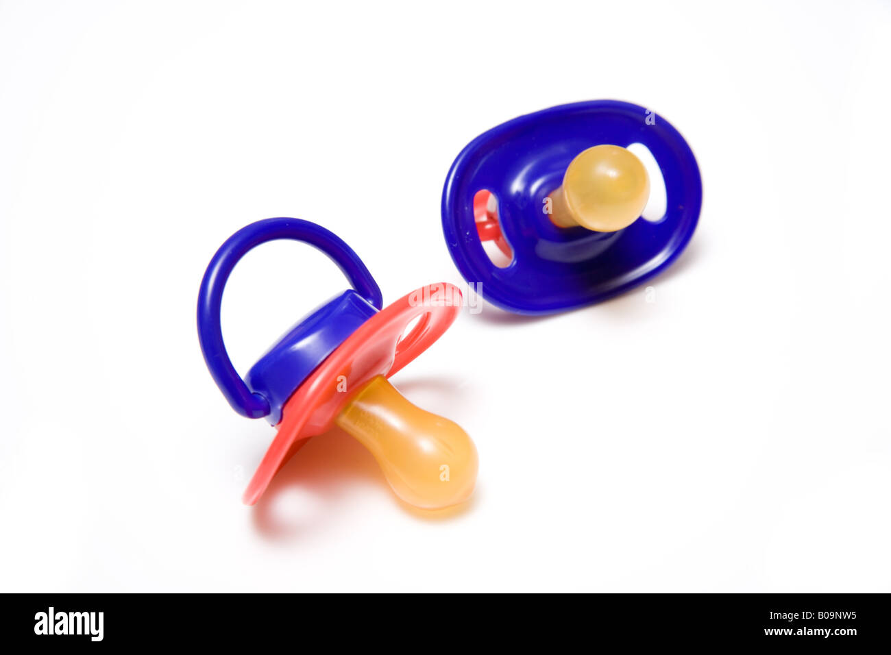 Babies dummies or pacifiers isolated on a white studio background Stock