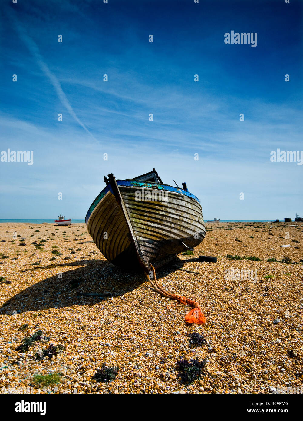 Dungeness - an abandoned old wooden fishing boat at Dungeness Kent ...