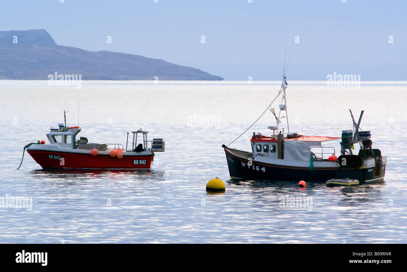 fishing boats at elgol by evening light treated with photoshop buzz simplifier filter Stock Photo