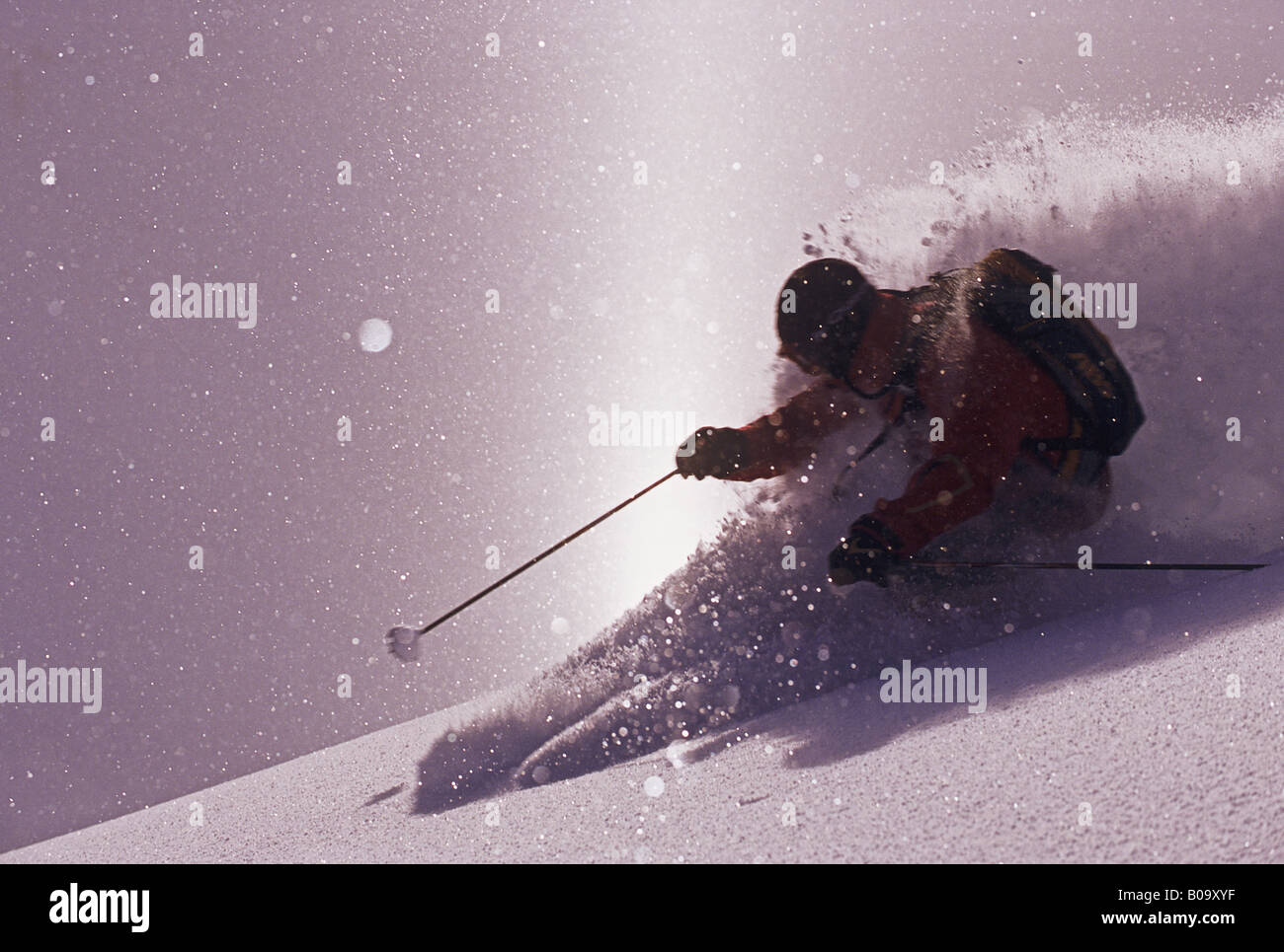 skier on the run in backlight, France, Alps Stock Photo